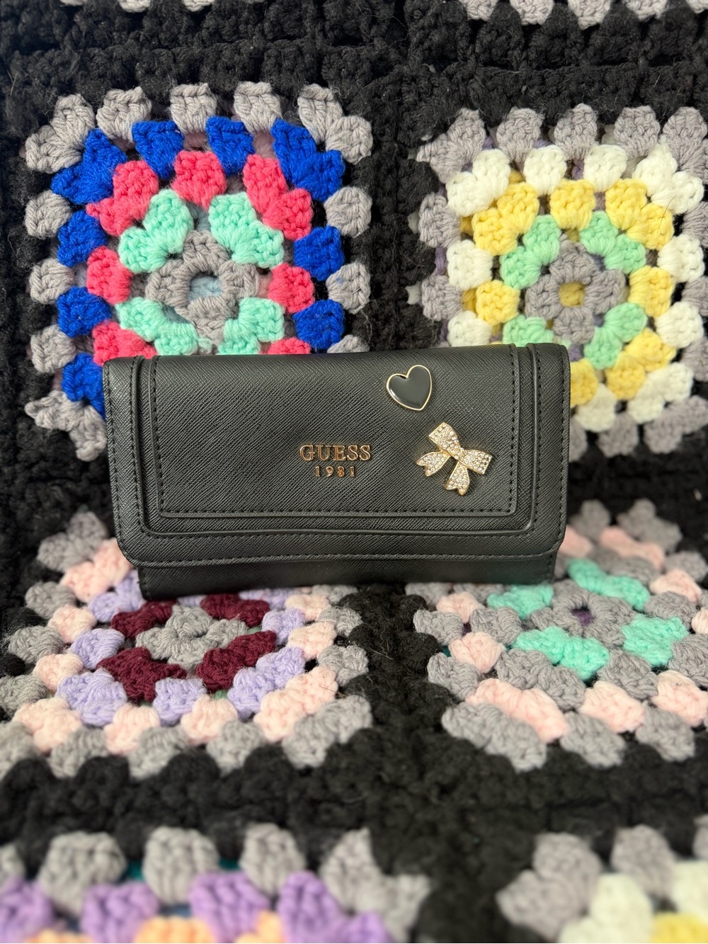 GUESS Black Wallet with Gold Heart & Bow Accents